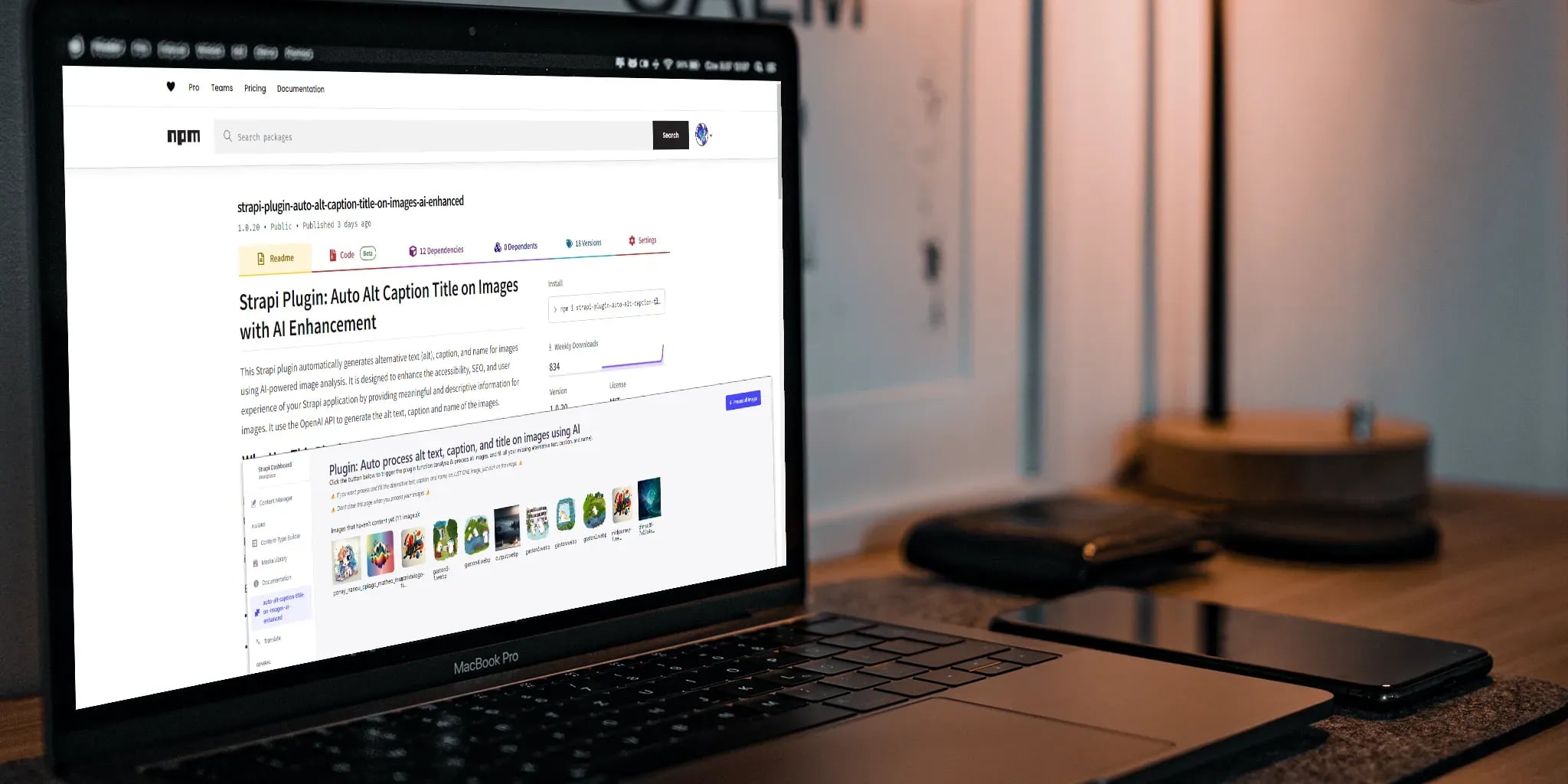 Laptop on a desk showing a webpage for a Strapi plugin on npm website, surrounded by a smartphone, notepad, and lamp.